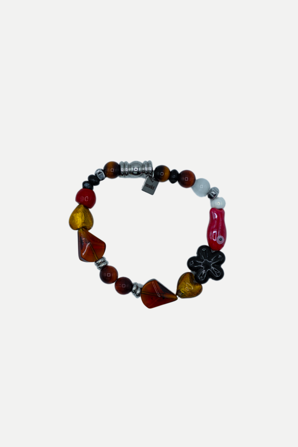 Bracciale Jack Da Polso multicolore con elementi rossi, ambrati, gialli e neri, fiore nero e dettagli color argento